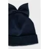 Blue hat with a bow