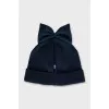 Blue hat with a bow