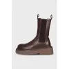 Brown leather boots with high soles