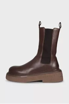 Brown leather boots with high soles
