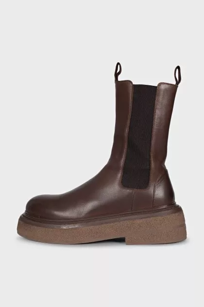 Brown leather boots with high soles