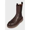 Brown leather boots with high soles