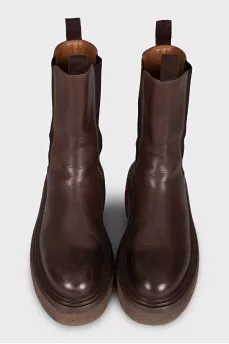Brown leather boots with high soles