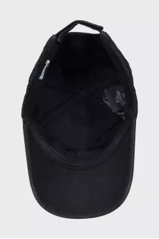 Cap decorated with branded embroidery