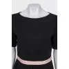 Fitted dress with a front pleat