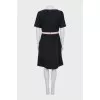 Fitted dress with a front pleat