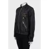 Jacket with a zipper and a patch