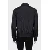 Jacket with a zipper and a patch