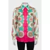 Silk shirt with a bright print and tag