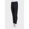 Wool trousers with zippers at the bottom