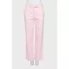 Pink loose-fitting trousers with tag