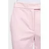 Pink loose-fitting trousers with tag