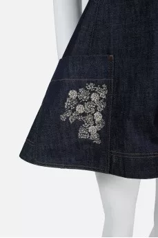 Denim mini-dress is flared