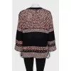 Loose-fitting jumper with buttons