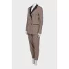 Plaid suit with leather inserts