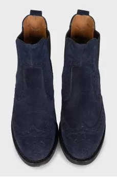 Blue suede boots with perforations
