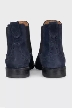 Blue suede boots with perforations