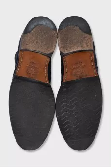Blue suede boots with perforations