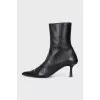 Black leather ankle boots with heels