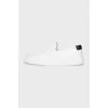 White textile slip-ons