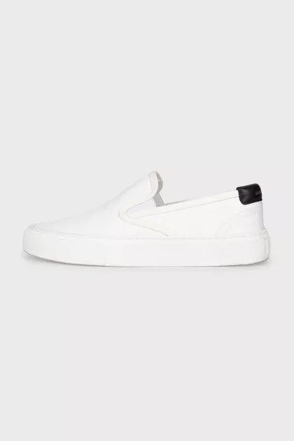 White textile slip-ons
