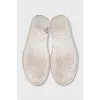 White textile slip-ons