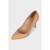 Patent leather shoes with gold heels