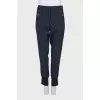 Tapered striped trousers with cuffs