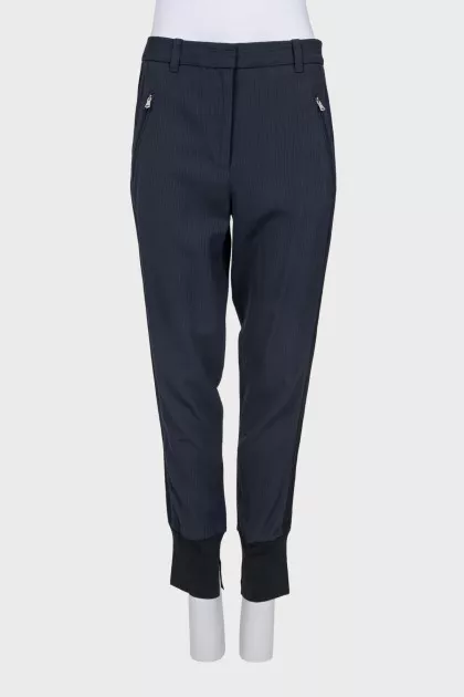 Tapered striped trousers with cuffs