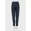 Tapered striped trousers with cuffs