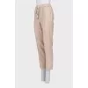 Beige trousers with metallic thread