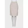 Suit consisting of a jacket and skirt with pockets