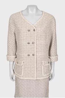 Suit consisting of a jacket and skirt with pockets