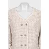 Suit consisting of a jacket and skirt with pockets
