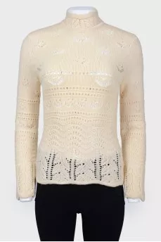 Vintage knitted sweater with a fastener