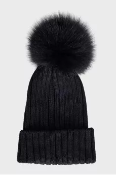 Black hat with a pompom