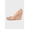 Beige wedge shoes
