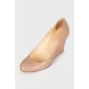 Beige wedge shoes
