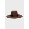 Suede hat decorated with feathers
