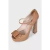 Brown patent leather shoes
