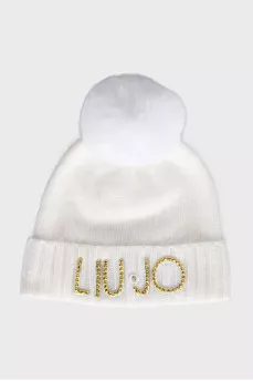 White hat with a golden logo