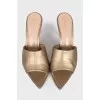 Gold-colored leather mules