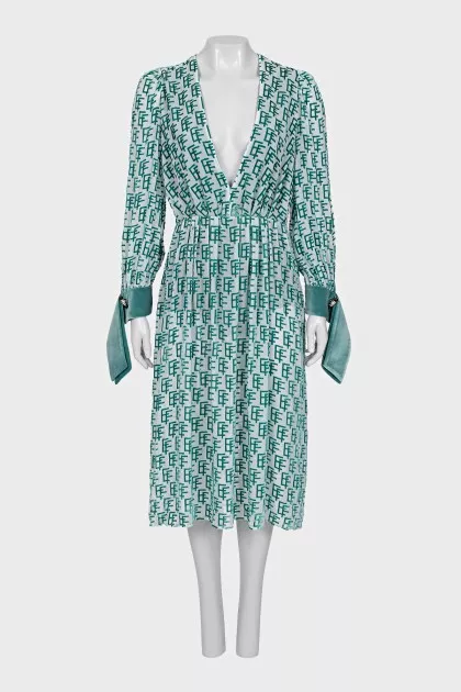 Dress with a branded monogram and tag