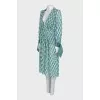 Dress with a branded monogram and tag