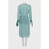 Dress with a branded monogram and tag