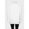 White cardigan with asymmetrical fastening