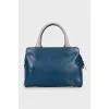 Blue leather bag with patch pocket