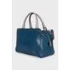 Blue leather bag with patch pocket