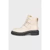 Leather boots with straps and buckles
