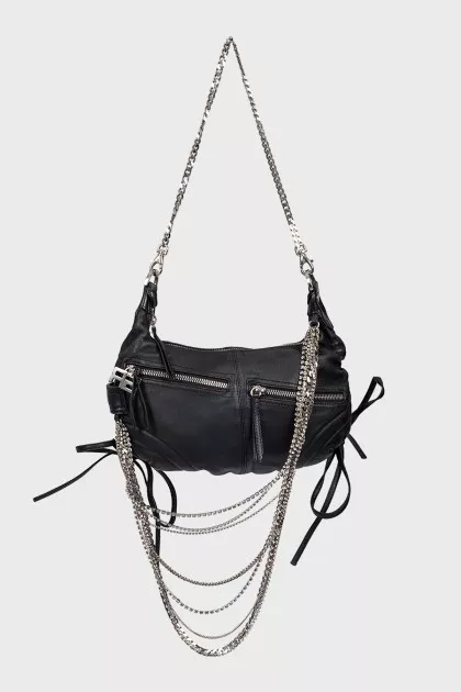 Leather bag decorated with chains and crystals